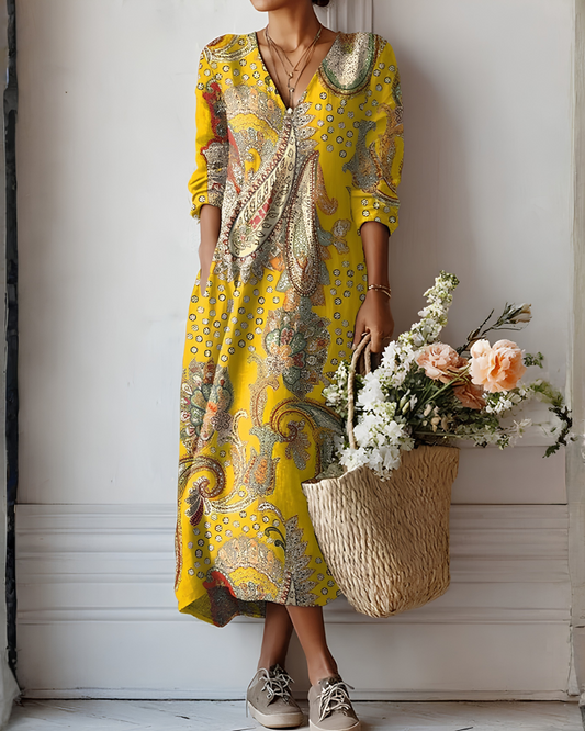 Celia | Vestido midi fluido amarillo con estampado paisley elegante