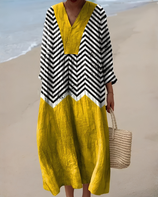 Naira | Vestido midi fluido amarillo con estampado geométrico moderno